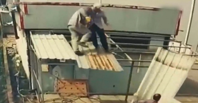 İşçilerin bastıkları levha bir anda kayınca böyle düştüler